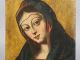 un tableau représentant une femme portant un voile noir