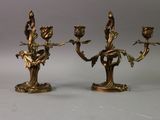 pair of antique brass candlesticks with flowers and leaves