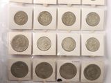 a lot of coins that are sitting on a table