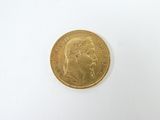 an image of a gold coin on a white surface