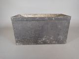 a metal container that is sitting on a table