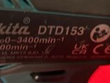 a close up of the back of a motorcycle with a sticker on it