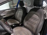 a picture of a car with two leather seats in it
