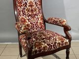 an image of a chair with a floral upholstered upholstered seat