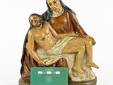 an image of a statue of a woman holding a man on her lap