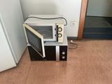 a microwave that is sitting on top of a microwave oven