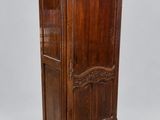 an old wooden armoire with carvings and carvings on the front