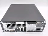 the back of a computer case with a hard drive attached to it