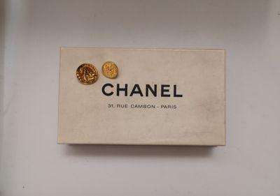 chanel logo on a box of chanel earrings