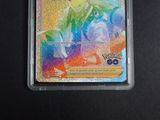 a close up of a card in a plastic case on a table