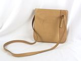 tan leather cross body bag with shoulder strap