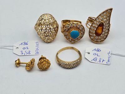 a group of rings and rings with price tags on them