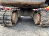a close up of a large truck with a big tire