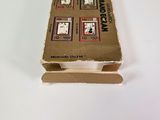 a cardboard box that has a picture of a man on it