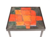 an image of a small table with a colorful design on it