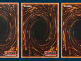 three cards with a picture of a black hole in the middle of them