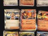 many different types of pokemon cards on the table