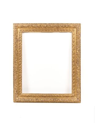 an old gold frame with a white background and a white wall