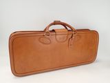 an image of a brown suitcase sitting on top of a white surface