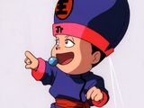 personnage de dessin animé représentant un garçon vêtu d'une tenue bleue et rouge, une brosse à dents dans la bouche