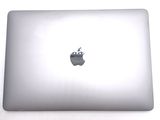 an apple logo on the back of an apple laptop