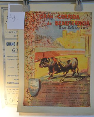 a picture of a poster on a wall with a bull