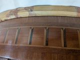 a close up of a wooden table with a pattern on it