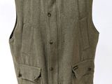 an image of a vest on a mannequin stand
