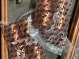 several rolls of doughnuts wrapped in plastic sitting on top of a table