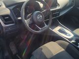 a picture of a car dashboard with a steering wheel