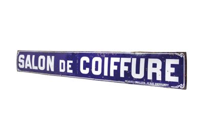 blue and white street sign with the words salon de coiffure on it