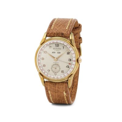 gros plan d'une montre sur fond blanc avec un bracelet marron