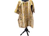 an image of a dress on a mannequin stand on a white background