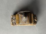 a small camera that is sitting on a table