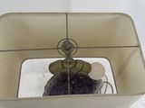 a picture of a lamp that is sitting on a table