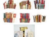 many different types of books stacked on top of each other