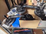 many different types of tools on a shelf in a room