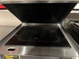 a grill that has a grill on top of it