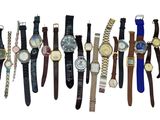a lot of watches that are lined up together