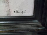 une photo d'une photo représentant une femme sur laquelle figure un nom