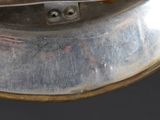 a close up of a metal object on a table
