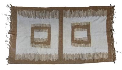 an image of a brown and white rug with two squares on it