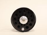 an image of a black and white reel on a white background