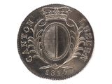 une image représentant une pièce de monnaie sur laquelle figure un blason