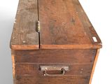 an old wooden box with a metal latch on it