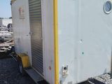 an image of a trailer that is parked in a lot