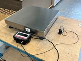 an image of a scale on a workbench in a factory