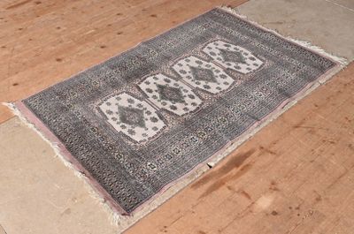 a rug on the floor with the word baa written on it