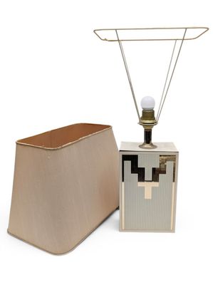 a lamp that is next to a box with a lamp on it