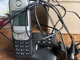 a cell phone that is sitting on top of a charger